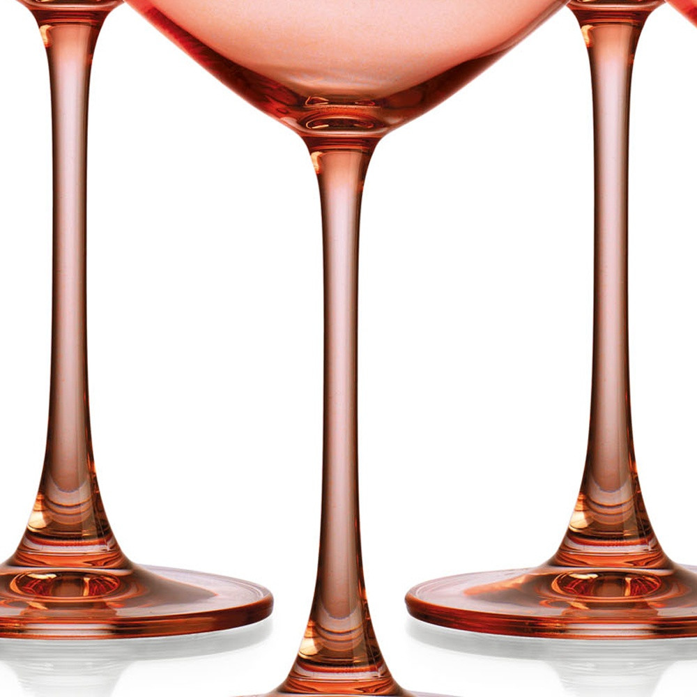 Set of Four Translucent Blush Coral Coupe Glasses.