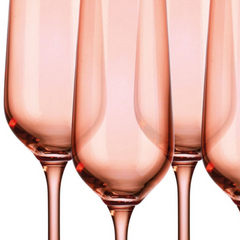 Set of Four Translucent Blush Champagne Flutes.